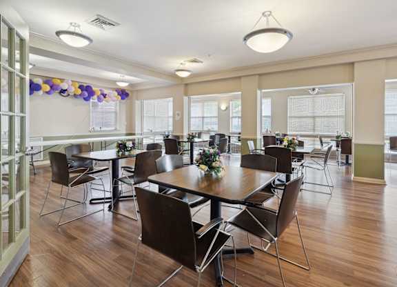 a large room with tables and chairs