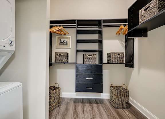LaVie SouthPark Apartments Model Walk in Closet and Stacked Washer and Dryer
