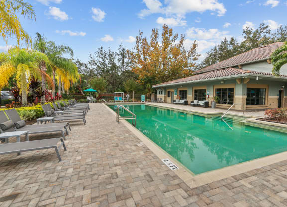 pool with lounge seating at The Preserve at Westchase, Tampa, 33626