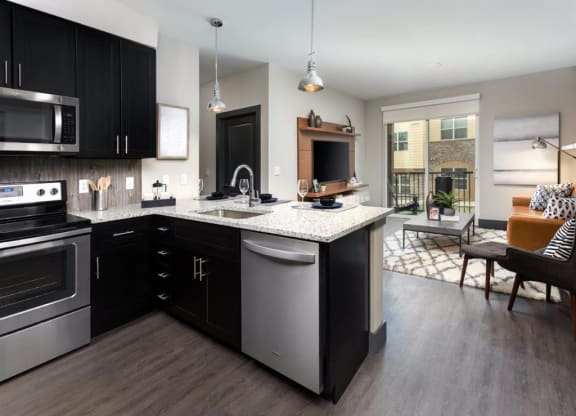 Kitchen With Living Room at Montane, Parker, CO, 80134