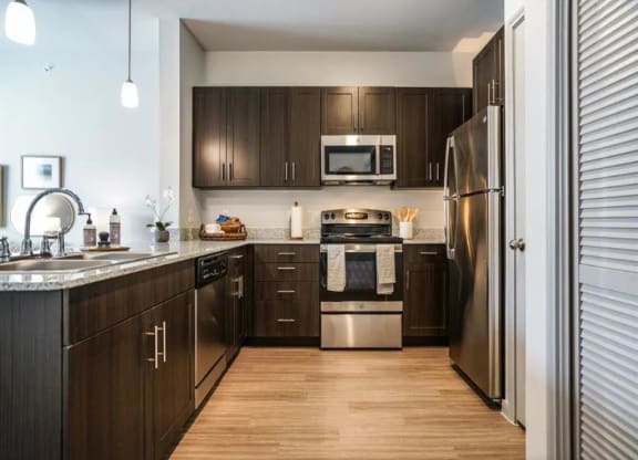 Kitchen with appliances at Emerson at Buda, Buda, 78610