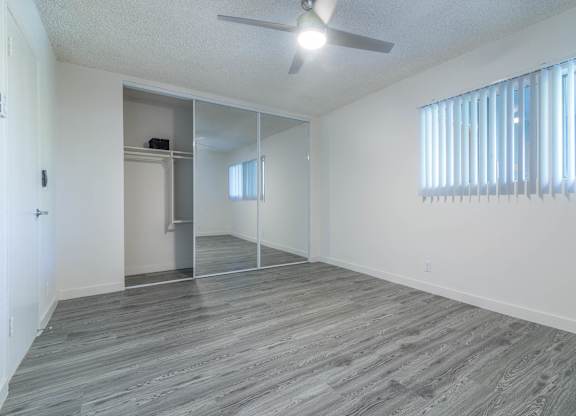 Bedroom view with closet
