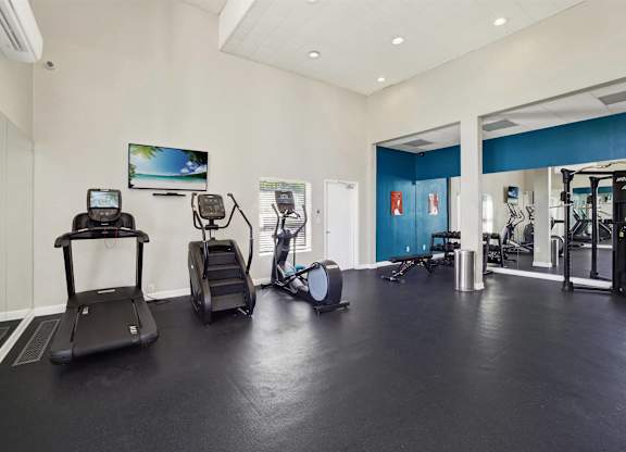 Spacious fitness center with cardio equipment and strength training area at Parc @ 5 Apartments, California, 90240