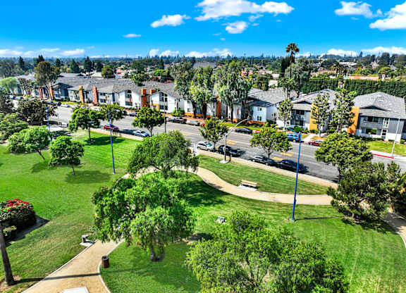 A residential area with houses and greenery at The Square in Downey, CA, 90242