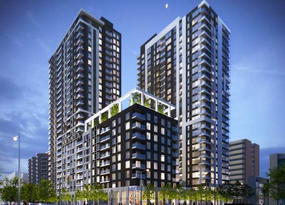 Two modern high-rise buildings with balconies and a green roof.
