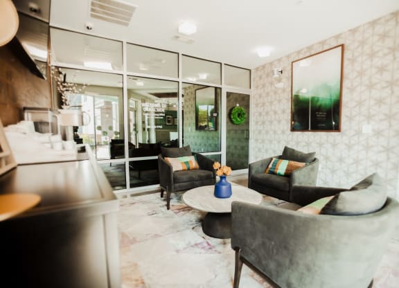a living room with couches and a table at Canalside, Augusta, GA