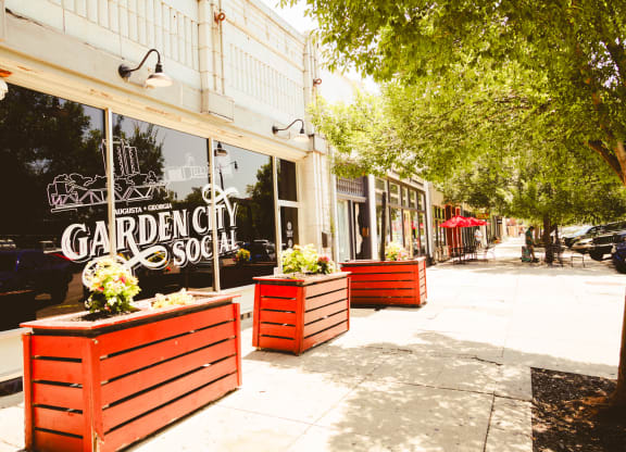 the sidewalk in front of a store called garden city soap at Canalside, Augusta, GA
