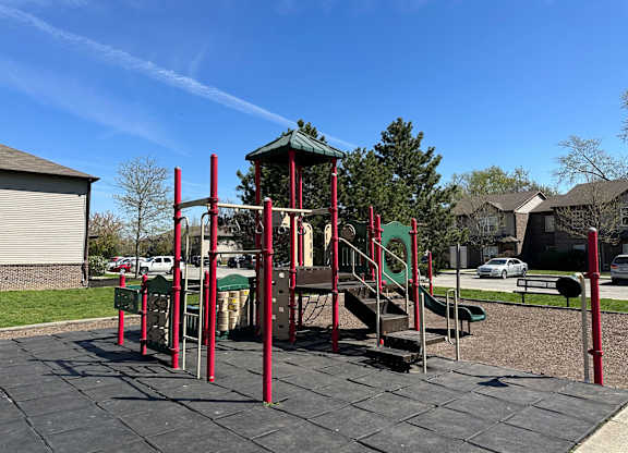 Outdoor playground with slides and climbing equipment at Northampton Village Apartments, Indianapolis, Indiana