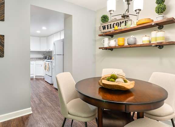 Convenient dining area offset from the kitchen, offering a functional and flexible layout.