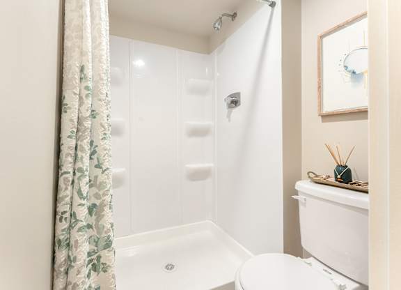 Full-sized walk-in fiberglass showers.