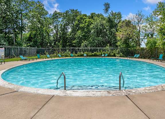 Residents enjoy a refreshing pool, fitness center, and planned community events.