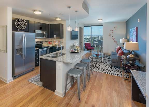 Every kitchen provides plenty of above and below cabinet storage.  Meal prep is easy on spacious kitchen countertops.