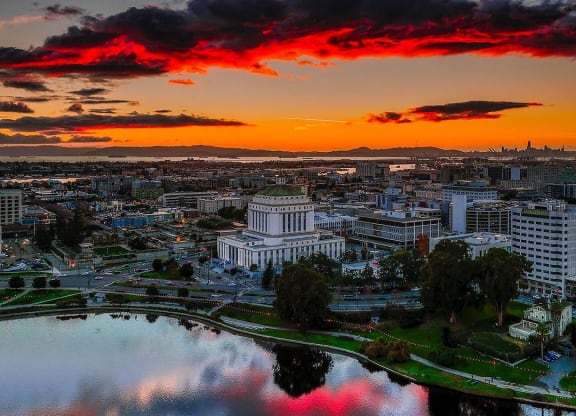 a sunset over the city of a city