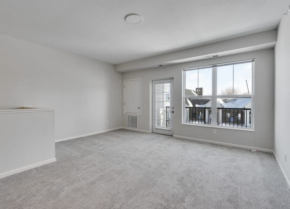 Living Room With Outdoor Balcony