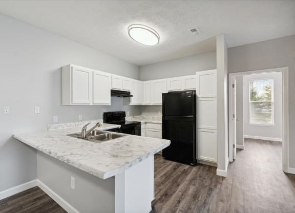 Fully-Equipped Kitchen with Black Appliances