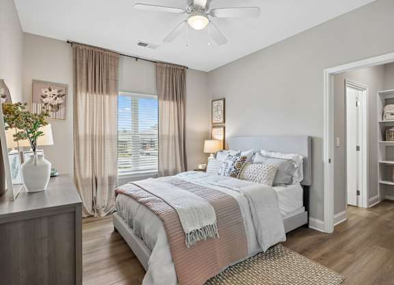 Bedroom with Wood-style flooring