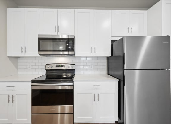 Kitchen With Tile Backsplash