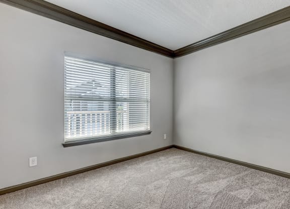 Bedroom Featuring Large Windows