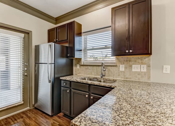 Fully-Equipped Kitchen with Granite Countertops