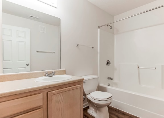 Bathroom with Wood cabinetry