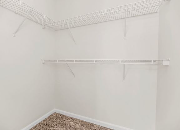 Walk-In Closet With Built-In Shelving