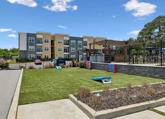 Patio area with cornhole