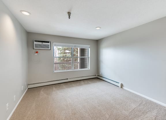 Bedroom with Large Double Windows and Recessed Lighting