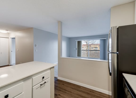 Kitchen Overlooking the Living Room with Grey Walls