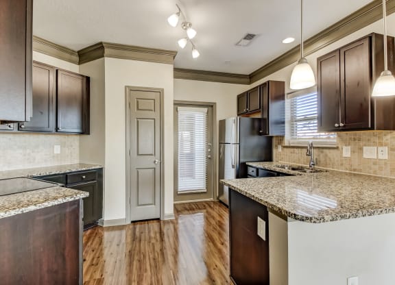 Kitchen with Upscale Wood Finish Flooring