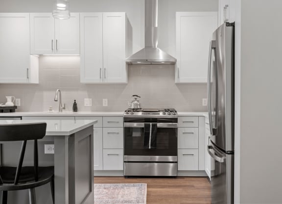 Kitchen Featuring Stainless Steel Appliances With Gas Range
