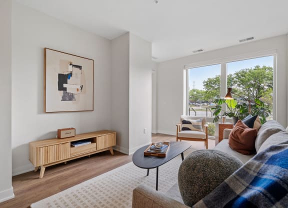 Living Room With Tall Ceilings & Sliding Glass Patio Door