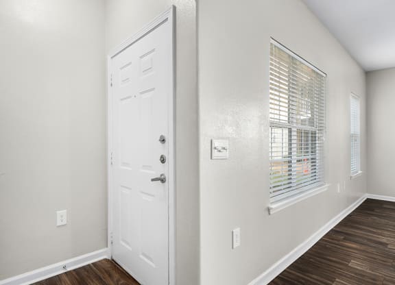 Front Door Entrance With Large Windows In The Living Area - Elms Floor Plan