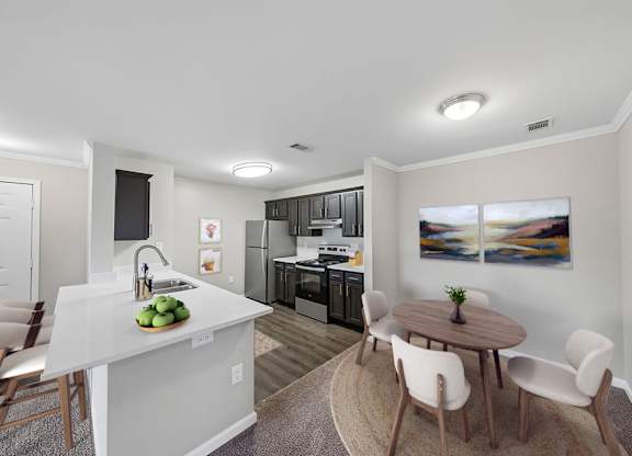 A kitchen with a separate dining area.