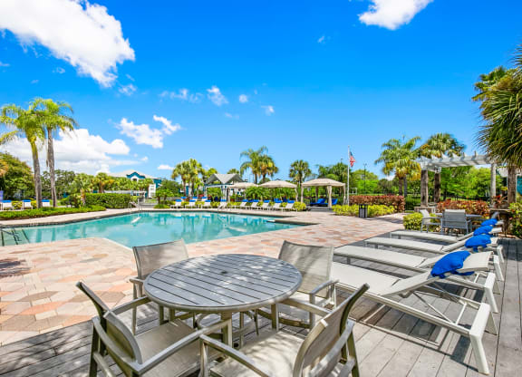 Tables & Chairs At The Pool Sundeck