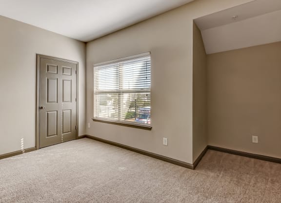 Spacious Bedroom with Plush Carpeting