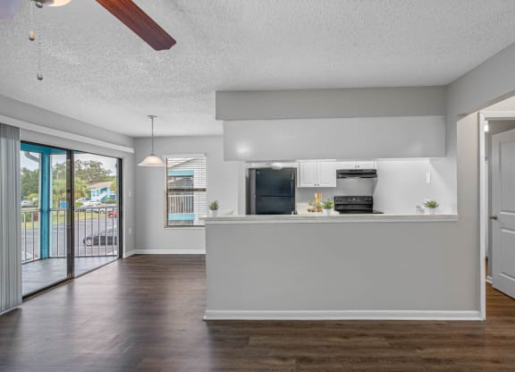 Spacious Living Area With Wood-Style Flooring