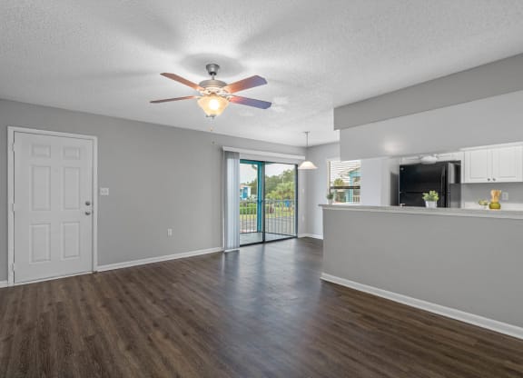 Spacious Living Area with Hardwood-Style Flooring