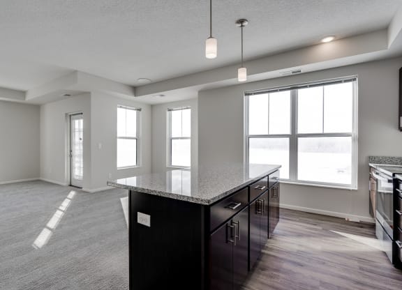 Spacious Kitchen With Large Granite Island