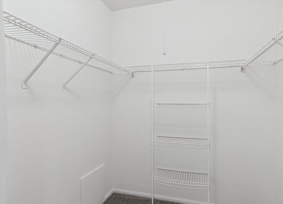 Walk-In Closet With Built-In Shelving