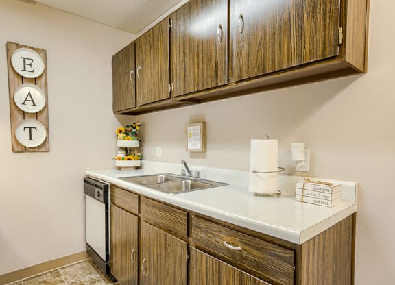 our apartments have a kitchen with a dishwasher and a sink
