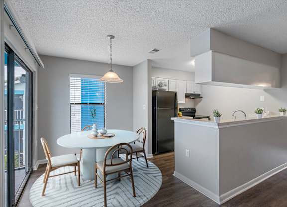 Separate Dining Area With Wood-Style Floors