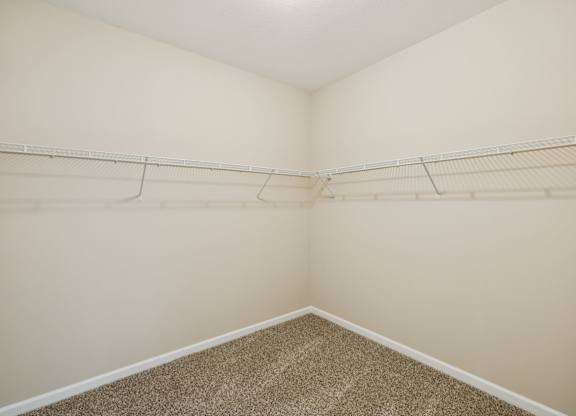 Walk-In Closet With Built-In Shelving