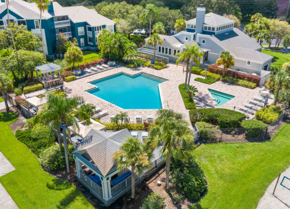 Aerial View Of The Pool, Sundeck & Clubhouse Area