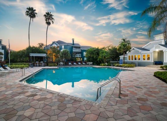 Resort-Style Pool & Sundeck At Twilight