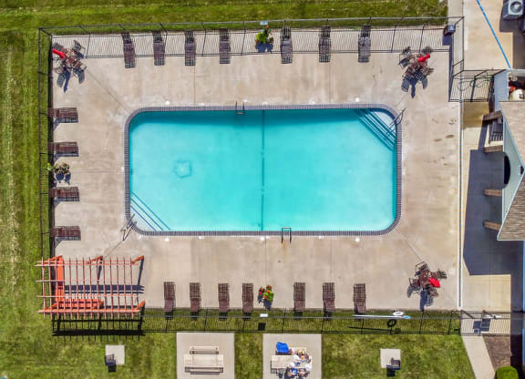 Aerial View Of The Pool & Sundeck With Lounge Chairs
