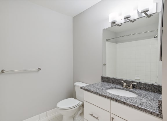 Bathroom With Granite Vanities