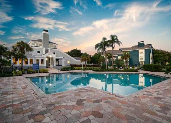 Clubhouse Overlooking The Pool & Sundeck At Twilight