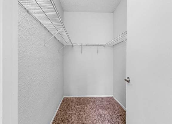 Walk-In Closet With Built-In Shelving
