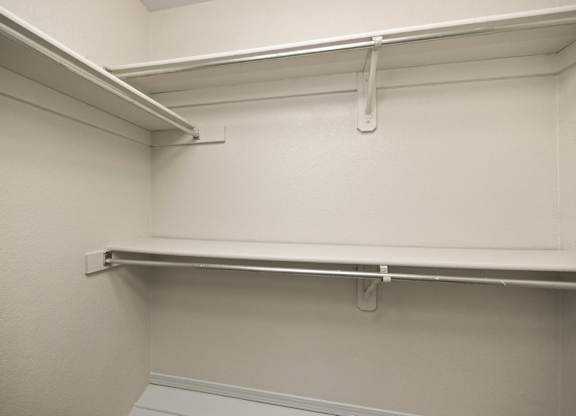 Walk-In Closet With Built-In Shelving
