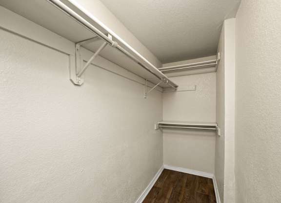 Walk-In Closet With Built-In Shelving